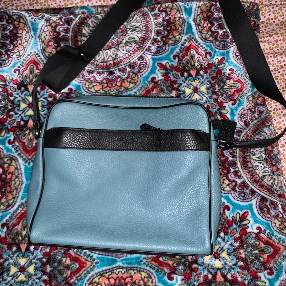 Men’s authentic coach messenger bag.